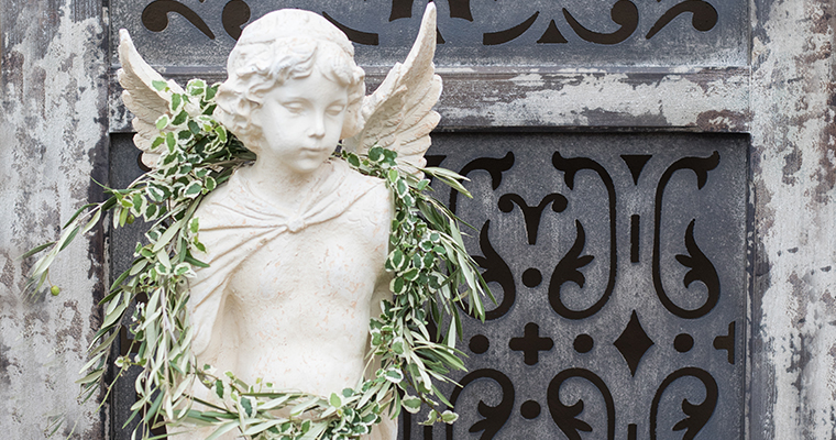 An image of an angel headstone for Christmas Opening