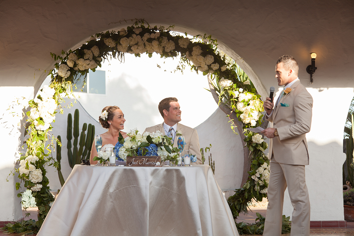 An image of one of the groomsmen giving a speech to the new couple at the Premoli-Herbert Wedding