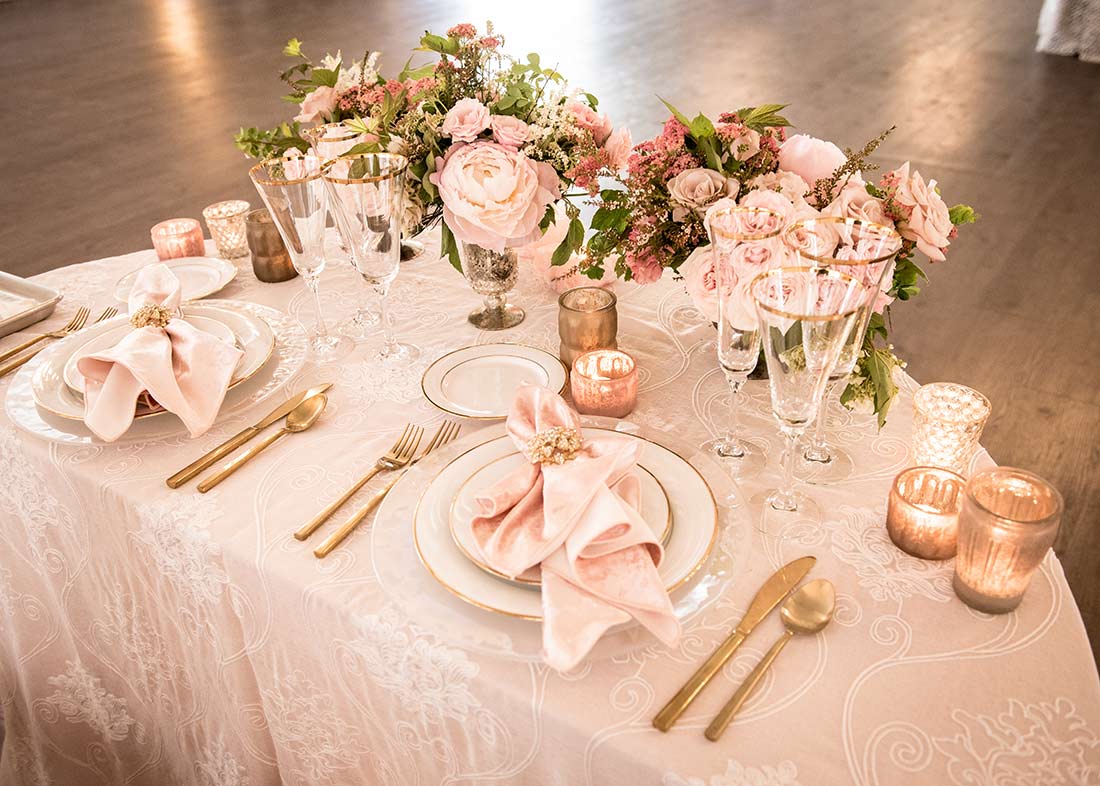 An image of a light pink dining set table for Fete Venue Wedding