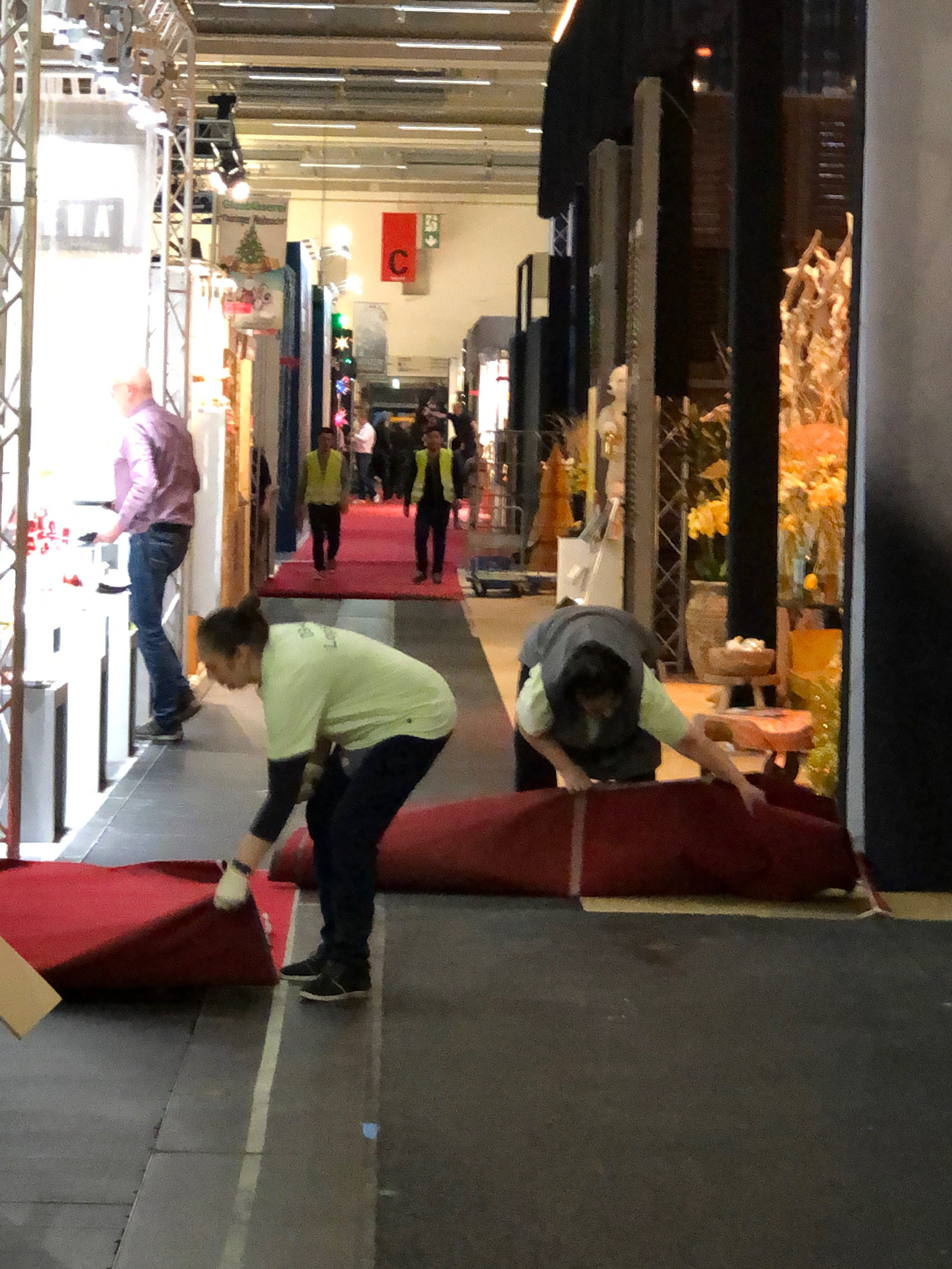 An image of the Christmas Germany event closed and workers starting to take out the carpet